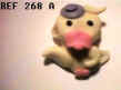 268 A CANARD JAUNE BEC ROSE CHAPEAU MAUVE.JPG (9965 octets)