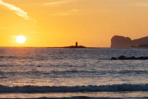 Sunset at the Lido in Alghero, with Capo Caccia in the distance