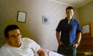 Chris looking ill again as Dave looks on