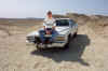 Author and Cadillac, Bahrain desert
