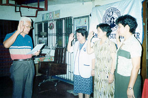 Vice-Mayor Hon. Esteban Abonal inducts the new members of the PAUW-CS. L-R: Judge Esteban Abonal, Mrs. Beata Arce, Mrs. Francis Almerol, and Mrs. Marilou Fornoles.