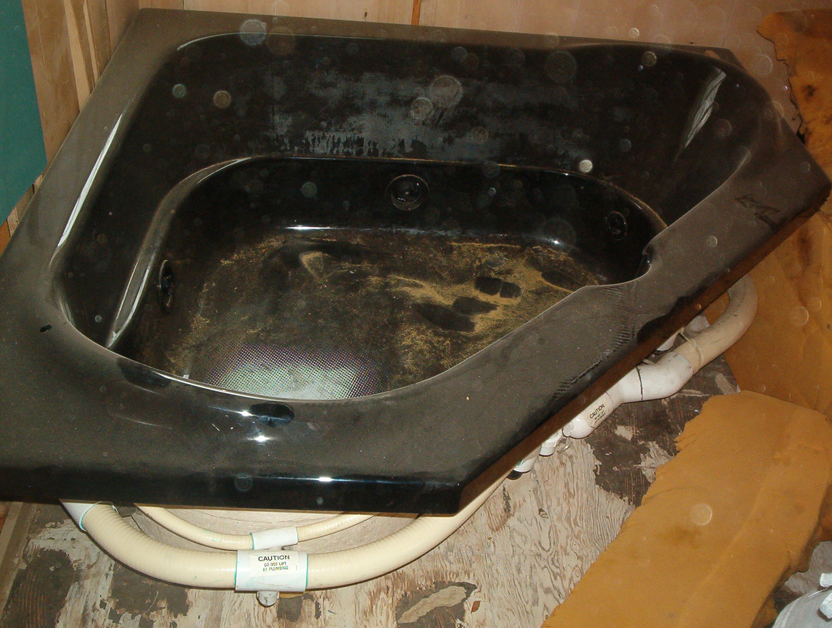 2 person corner spa tub-black ceramic over poly resin