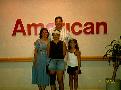 Neil at home with wife Ann and Juliann and Kari