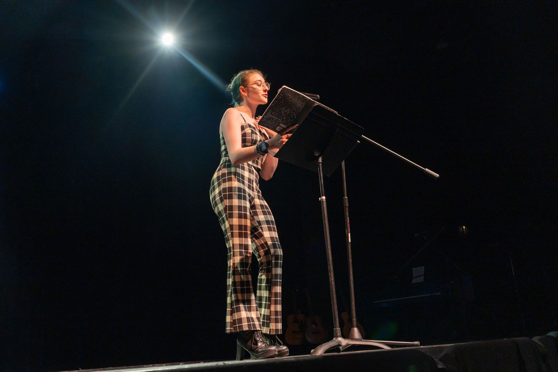 Photo of Phoenix Bullard presenting there poetry