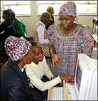 Pictures shows 

Students browsing the internet at Pecanet Cybercafe in Umuaka Njaba LGA Imo State 

Nigeria...