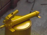 Reconditioned Enerpack Hand Pump After Being Tested Is Sprayed