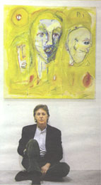 Paul with one of the paintings that have absorbed him since the death of wife Linda