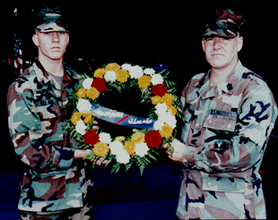 Marines with wreath.