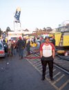 Local firefightes (in Background) deal with the fire.