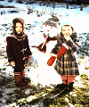 Lisa and Lee as kids, with the Snowman I built for them.