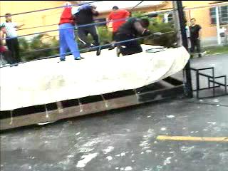 AJ Clotheslines Moreira