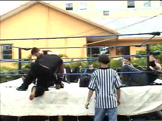 Pico shokes out Crippler on the bottom rope