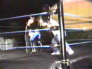 Scott Morgan attacks DBK with a chair