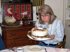 lenore blowing out candles