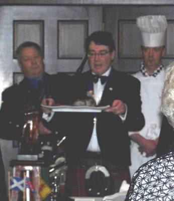 President Dr Donald Macgregor addressing the haggis
