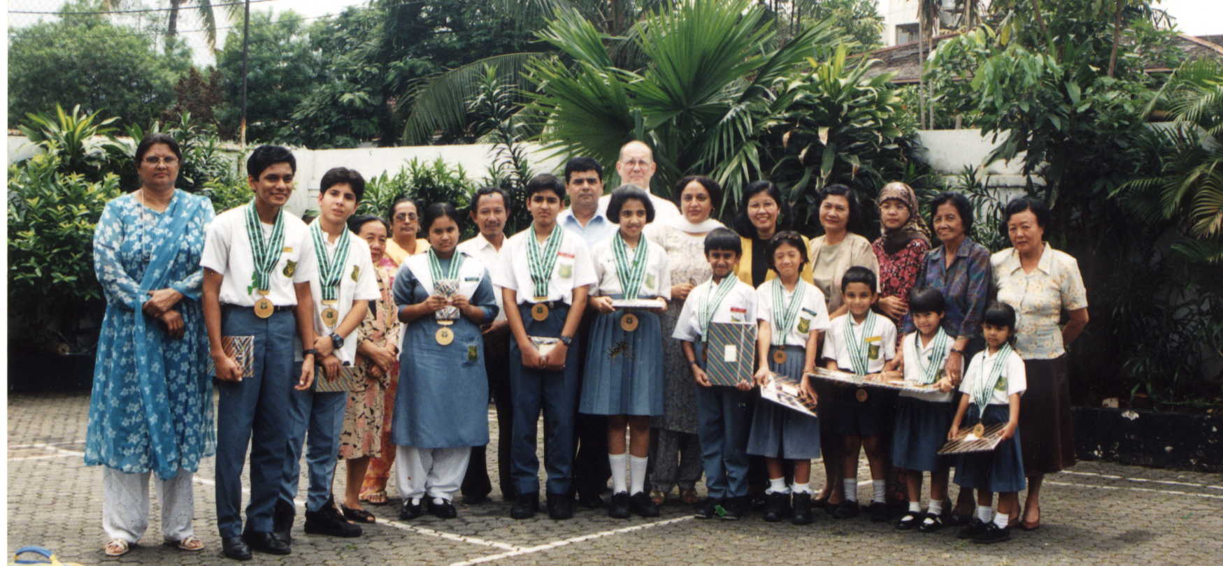 Winners of the Student of The Month Award and their� teachers for the month of December 1998.�