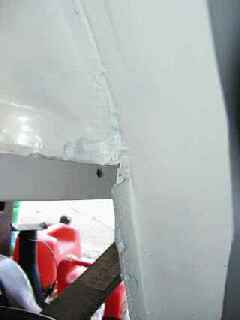 Driver Rear Wheel Well, Rearview