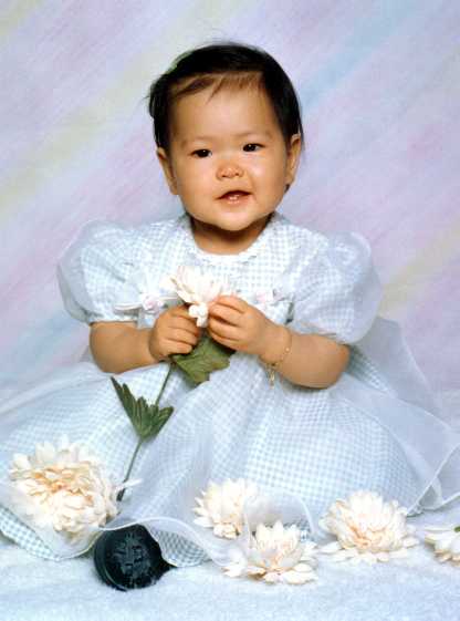 Katie with a flower