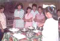 Training women in Isabel in food preparation