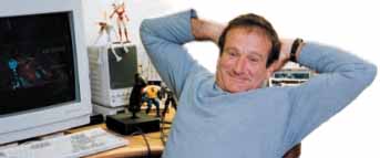 Robin Williams infront of computer