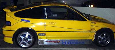 see cars that must be fast-because they have a lot of stickers on them!