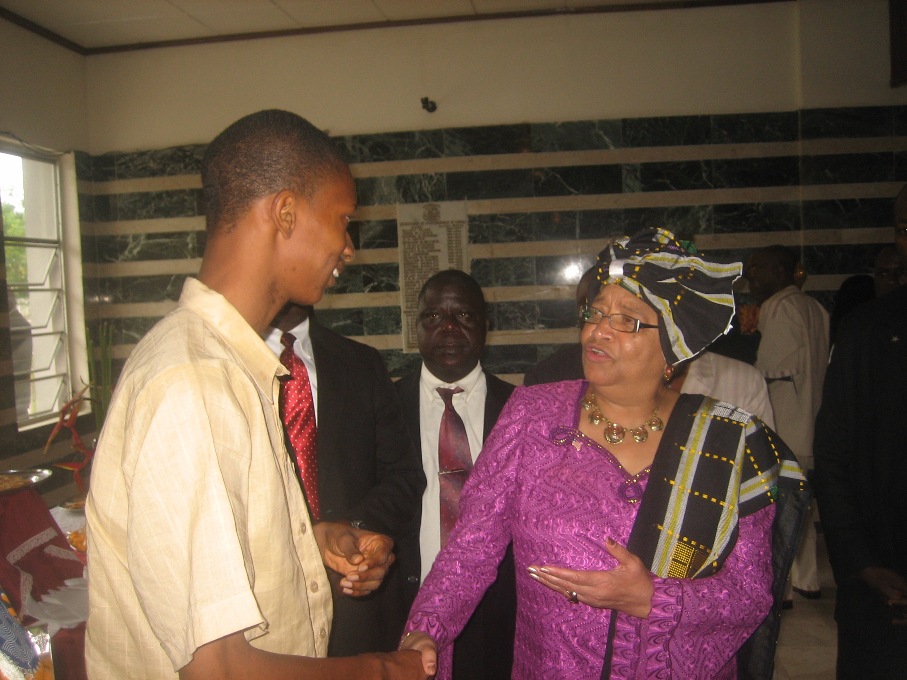 PHIL Tarpeh Dixon and LIberia's President, Madam Ellen Johnson Sirleaf discuss national issues
