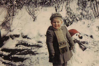 Me and a snowman at age 4