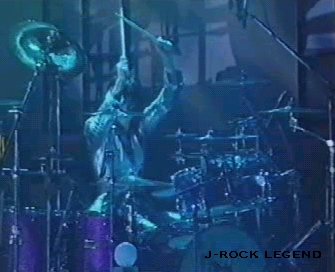 ...Kami-sama taps the drums to a hault...