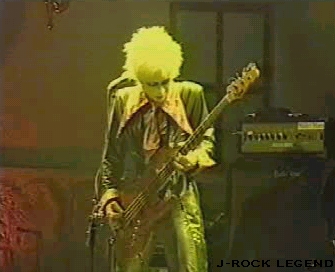 Yu~ki-sama : I've always felt he was a little under-appreciated, and the video offered some wonderful shots, so here are four of them, dedicated to Yu~ki-sama. Afterall, he *did* play the bass that everyone danced to! ^.~