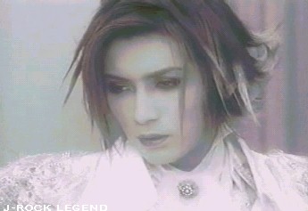 Gackt-sama and he sings, watching the fire around him...