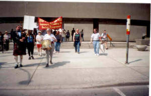 leading the march out of Nathan Phillips Square