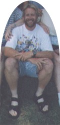 me sitting on steps with shorts and t-shirt