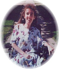 Danielle wearing a white dress with purple flowers