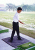 Trying golf - by the way, this guy is quite a pro!