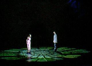 Fleur and Phoebus stalk ar-- err, profess their love under a rose-window spotlight