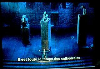 Gringoire sings a verse of "Le Temps" (verse captioned below him)