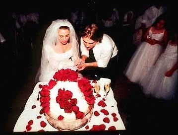 Tay and Natalie cut the cake at their wedding!