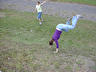 jill reese (bg) and christina berwaldt.. cartwheeling UP the hill