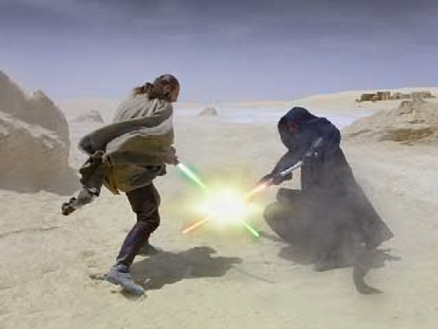 Qui-Gon Jinn fights the evil Darth Maul...