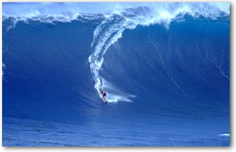 Laird Hamilton tows into a monster face at the legendary Jaws break in Hawaii.