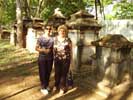 Jean and Maisy pose against the graves