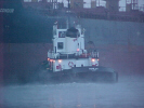Harbour tug working in the evening mist, Hamilton Ontario.