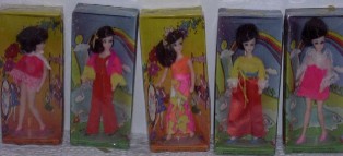 Click here to enlarge photo of odd boxed dolls
