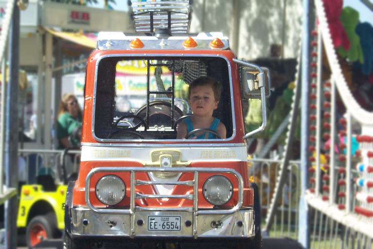 Hayden driving a firetruck