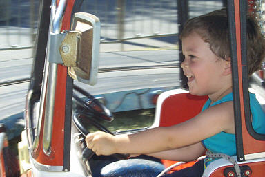 Hayden racing to a fire in his firetruck