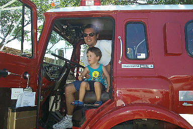 Jason and Hayden in a California Department of Forestry firetruck