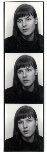 Three passport photos of me