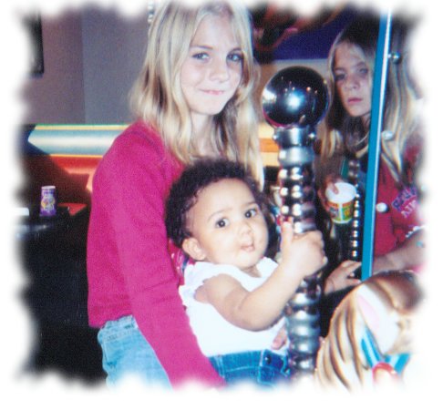 Here is me and my twin Aunt Kayla at Chuckie Cheese