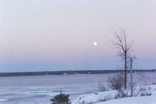 Photo: Moonscape over frozen river - taken by author, Jan. 2002