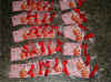 lembrancinha_10x7_com_laco_vermelho_3.jpg (193456 bytes)
